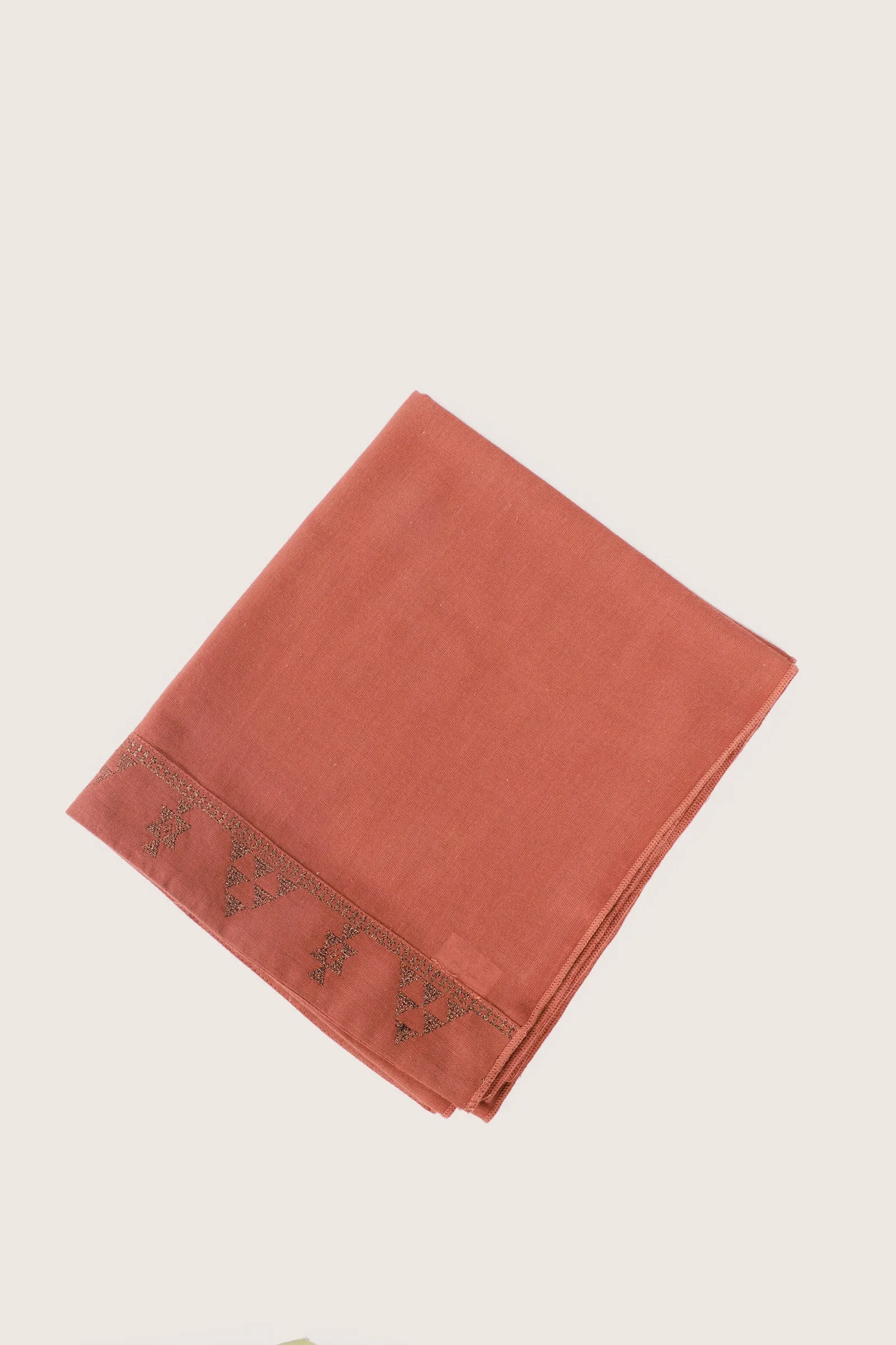 Embroidered shawl in cotton gauze.